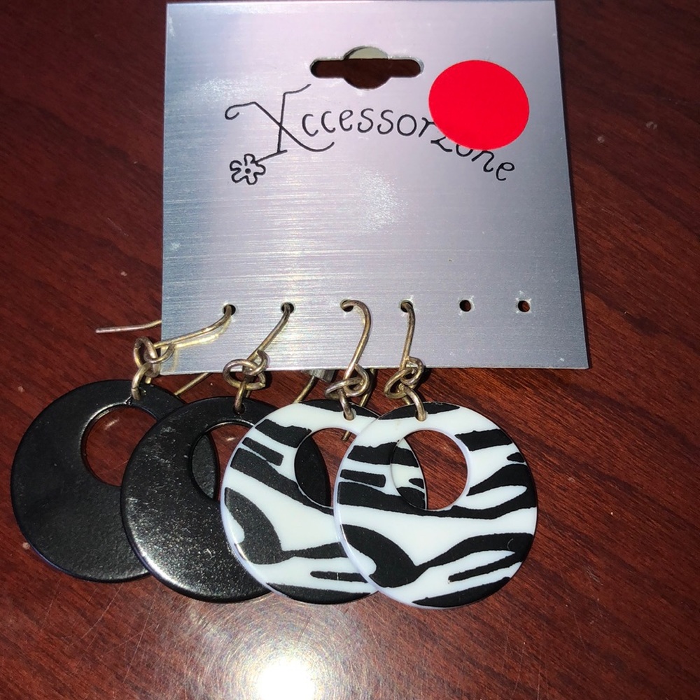 Xcesserzone earrings. 2 sets.